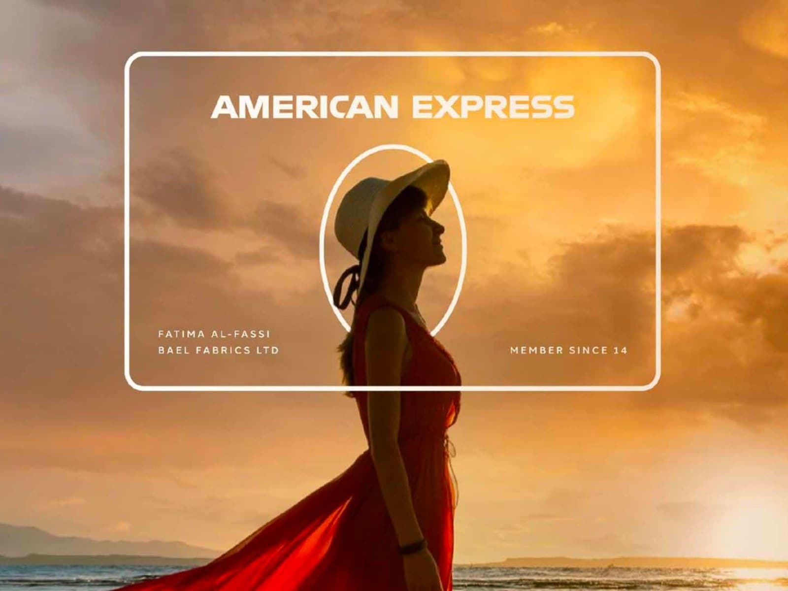 A woman in a red dress on a beach at sunset, with an American Express card graphic